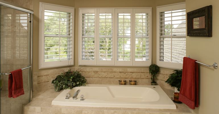 Plantation shutters in Bluff City bathroom.